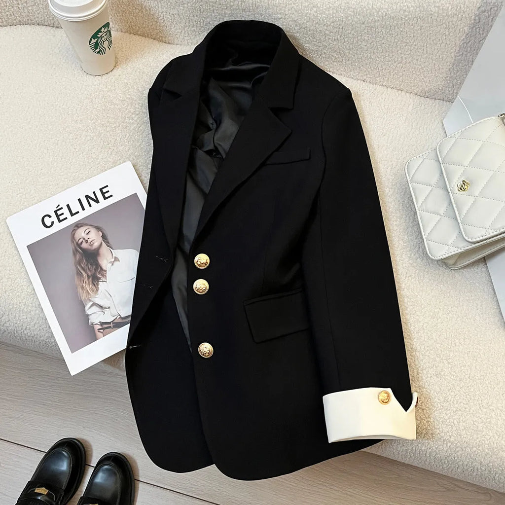 Korean style women's loose fit coat in milky white or black polyester with long sleeves and pockets