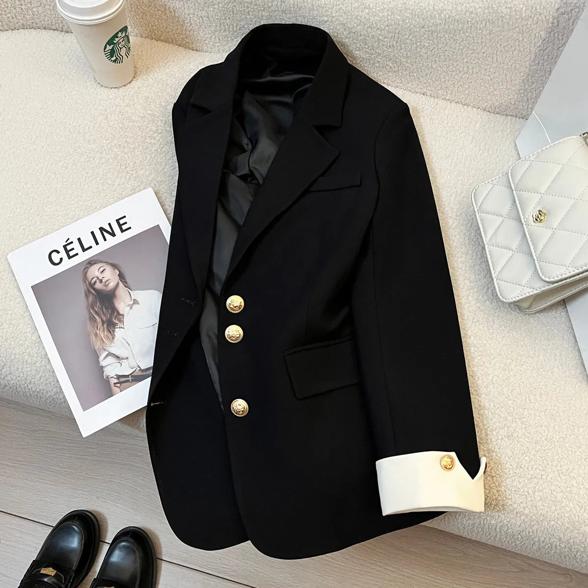 Korean style women's loose fit coat in milky white or black polyester with long sleeves and pockets