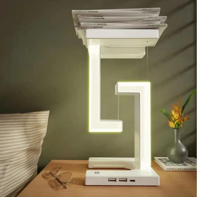 White magnetic suspension table lamp with wireless charging, touch switch, USB power, 12 x 12 x 22 cm, floating light design.