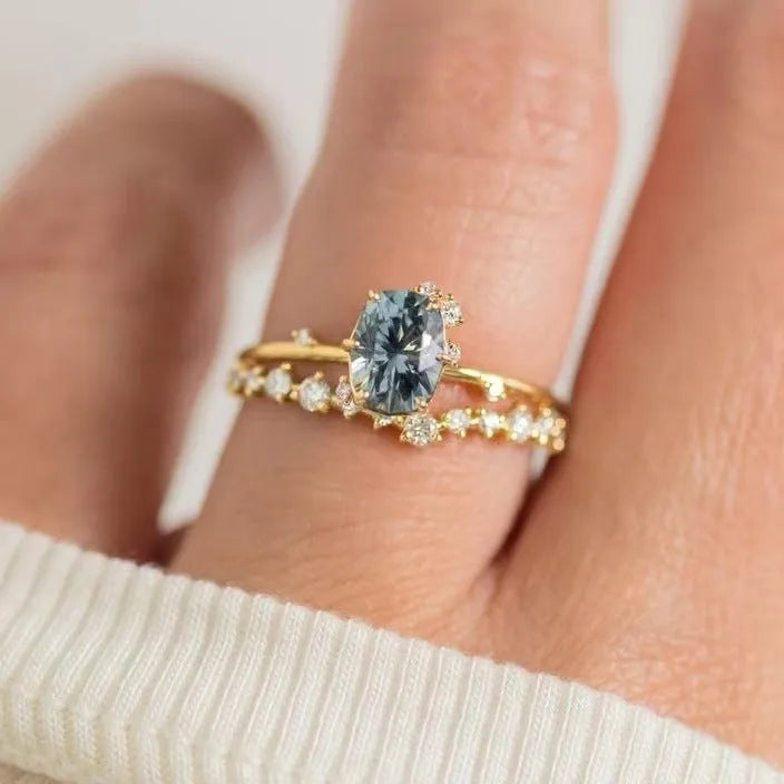 Gold plated women's ring with green zircon flower design on alloy band