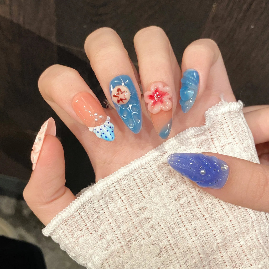 Three-dimensional carved jellyfish design plastic wearable armour set in almond nail colour