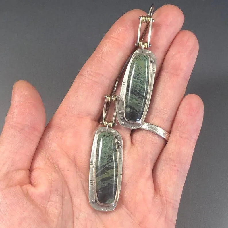 Geometric alloy earrings with two-tone marble pattern design