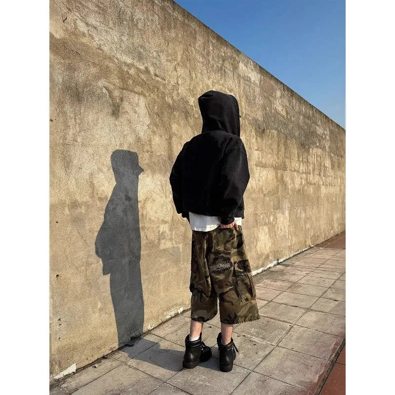 Men's camouflage cropped jeans with ripped detailing and loose straight leg fit