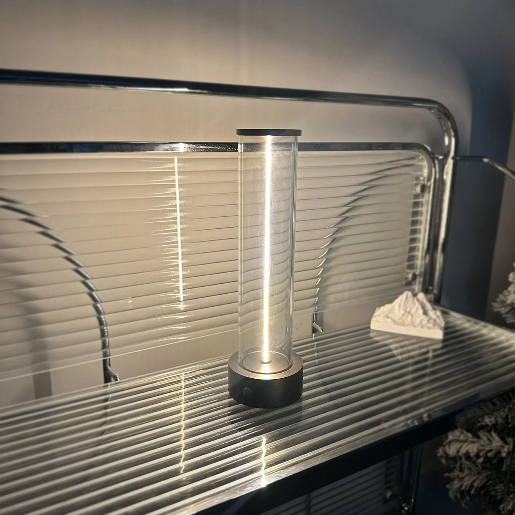 Slim clear glass LED light strip with magnetic base and USB charging cable