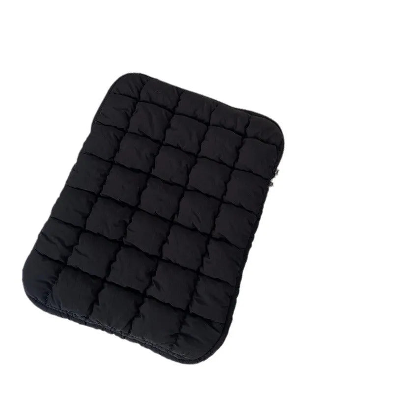 Large black nylon laptop bag open showing interior compartments for 15.6 inch computer