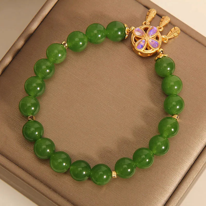 Green jasper crystal bracelet with four-leaf clover dream catcher pendant for women.