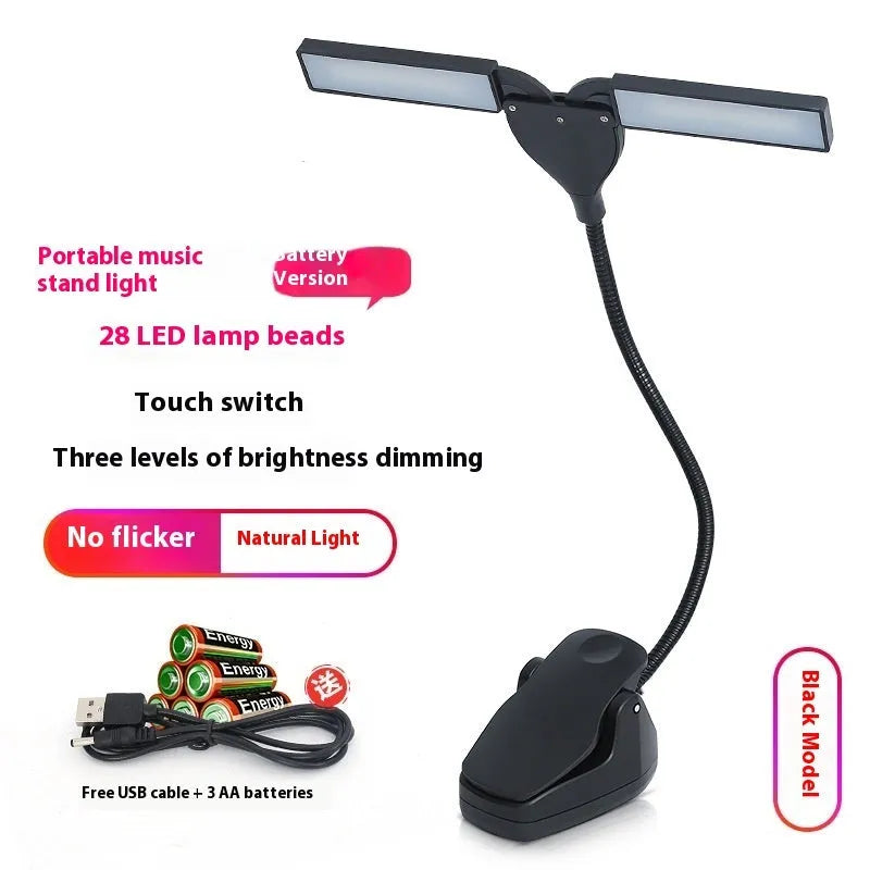 Black rechargeable LED music stand lamp with clip, shown illuminating sheet music.