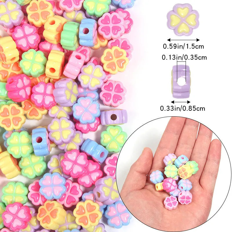 Acrylic four-leaf clover love beads with frosted finish in assorted light colours, 15mm size