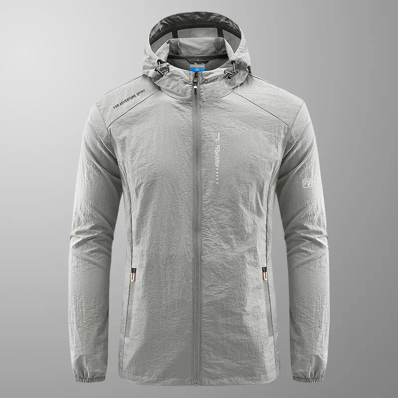 Men's light grey hooded summer jacket showing loose fit and nylon fabric texture