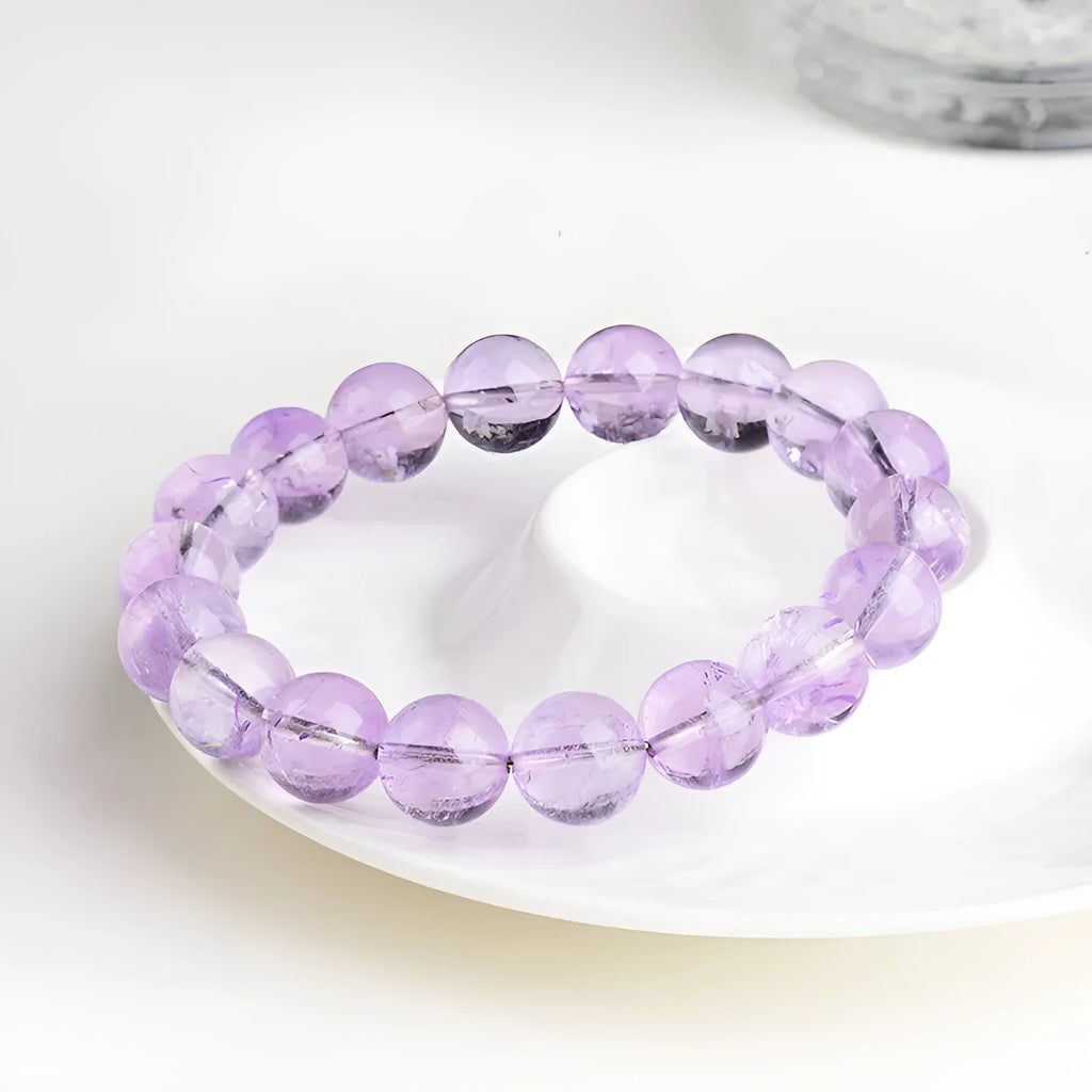 Lavender amethyst bracelet with geometric round beads in cream or transparent colours