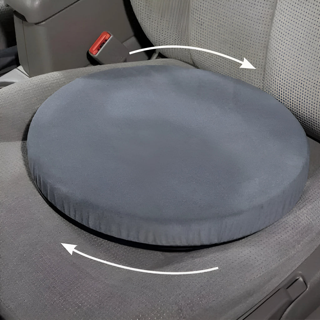 Grey rotating car seat cushion with non-slip base on a car seat, showing swivel function.