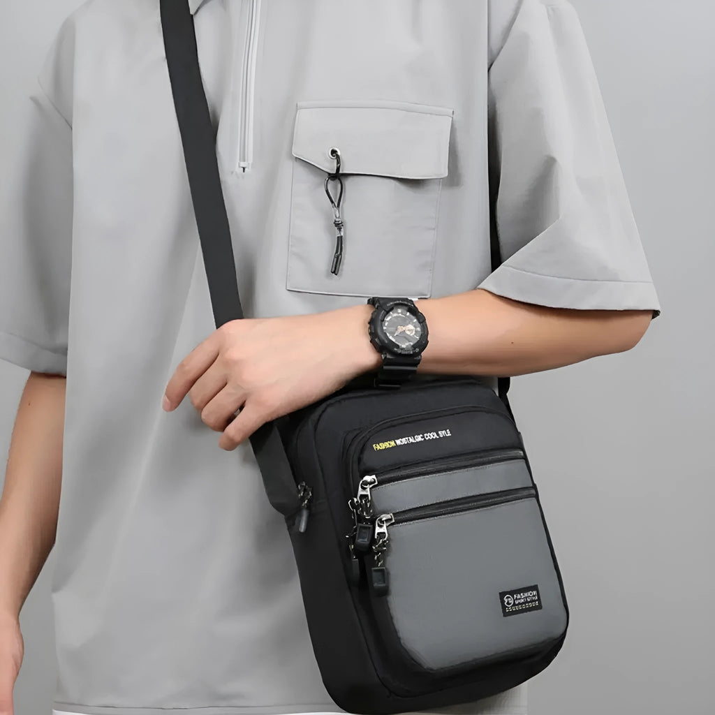 Men's crossbody bag in waterproof nylon with urban style and sewing thread details