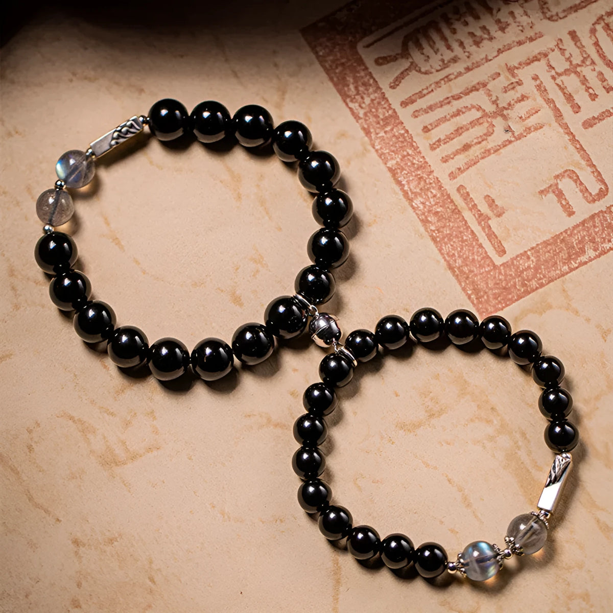 Black obsidian couple bracelet DIY set with 10mm and 8mm beads and adjustable string.