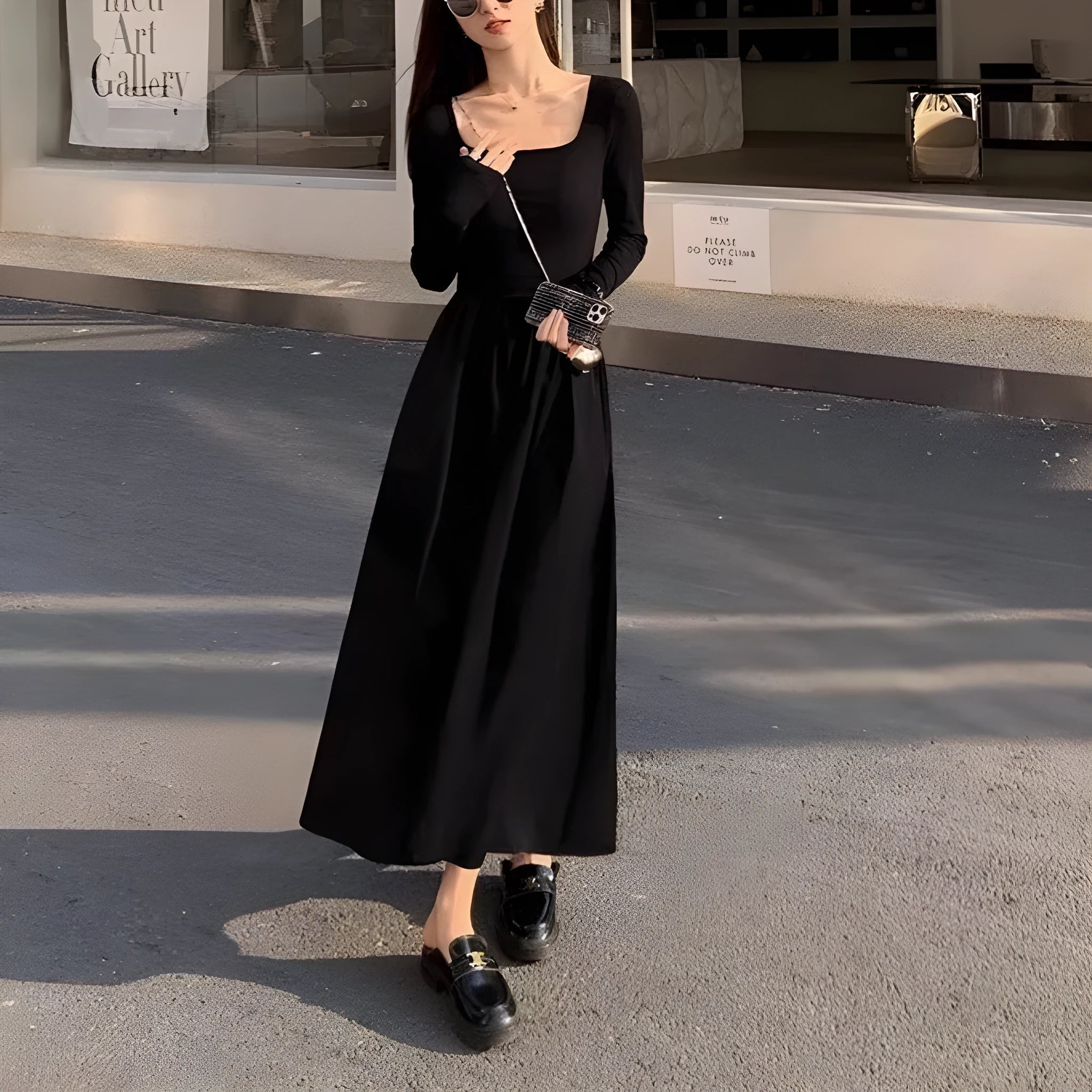 Black square collar knitted A-line dress with elastic waist and long sleeves