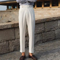 Slim fit straight cut men's suit trousers in apricot, black, or white.