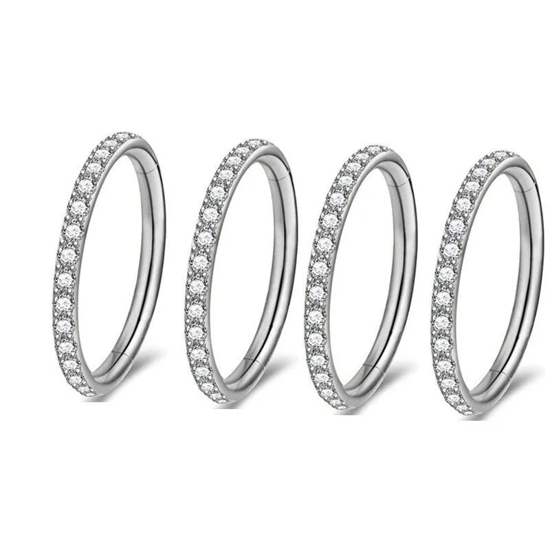 Stainless steel seamless round nose ring showing electroplated colour variations and size specifications