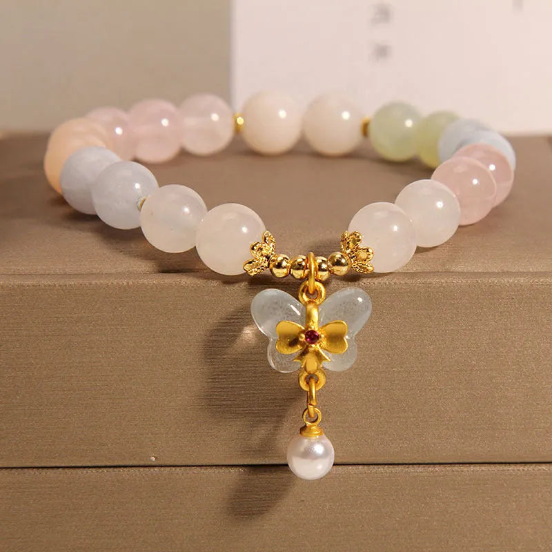 Women's crystal bracelet with a colourful morganite butterfly pendant in an original design.