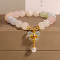 Women's crystal bracelet with a colourful morganite butterfly pendant in an original design.