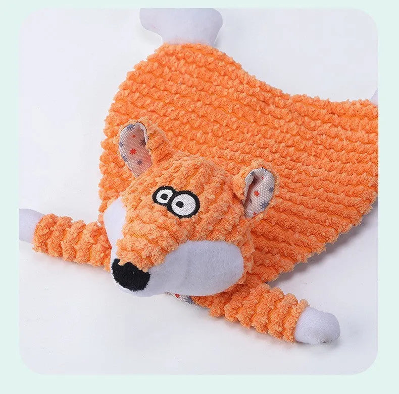 Brown velvet plush fox-shaped pet toy on a white background