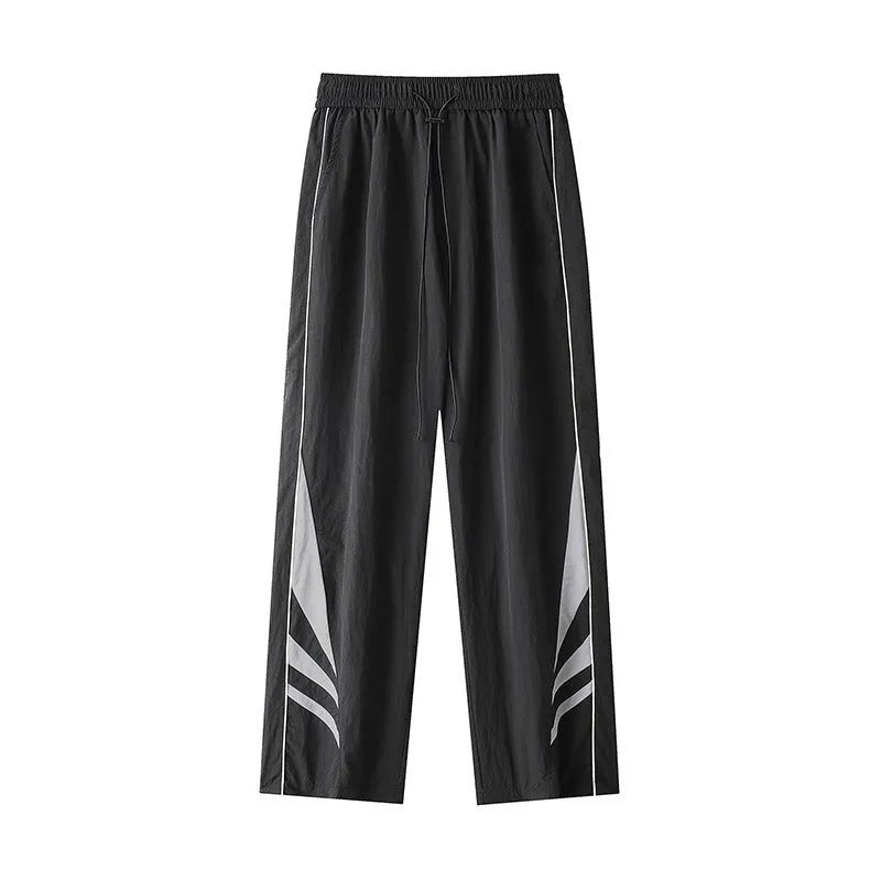 Men's straight-leg casual trousers in grey, showing elastic waistband and thin summer fabric.