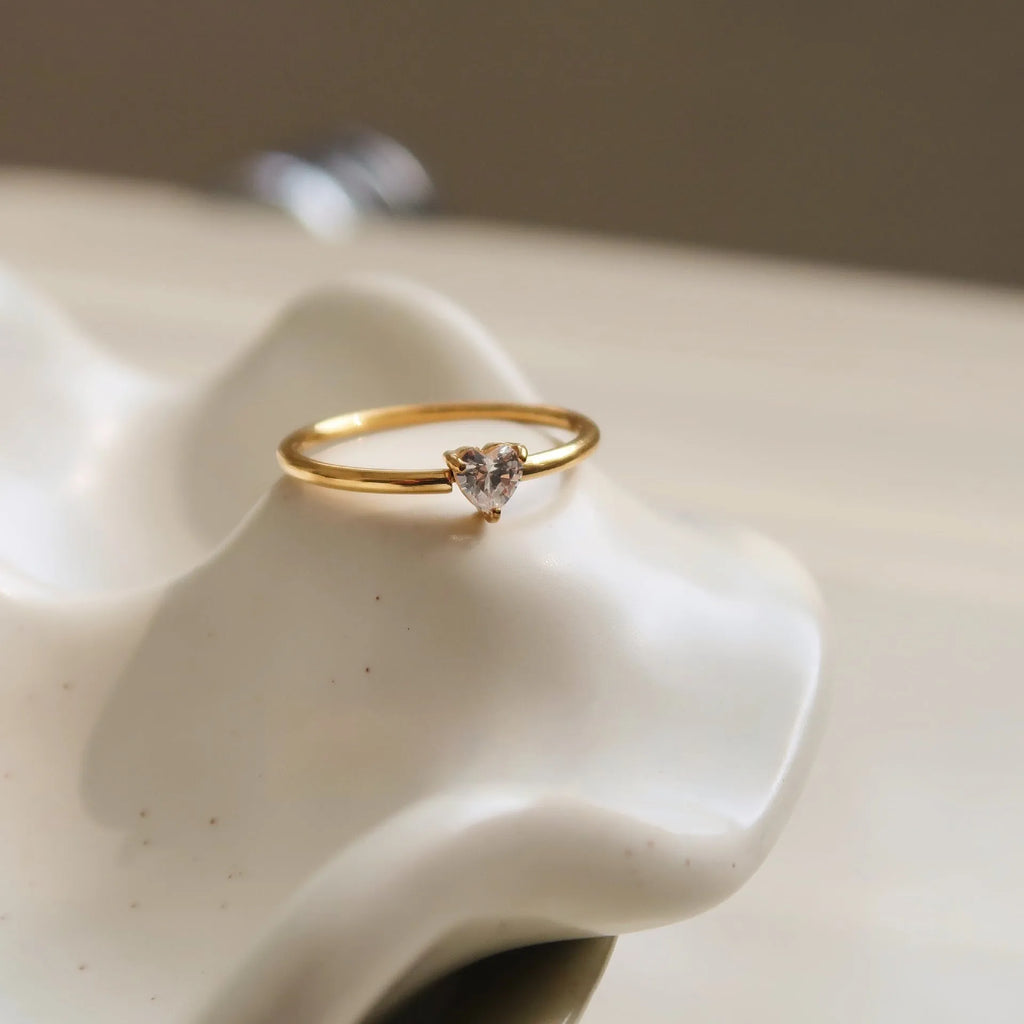Golden heart-shaped stainless steel ring for women available in sizes 6-8
