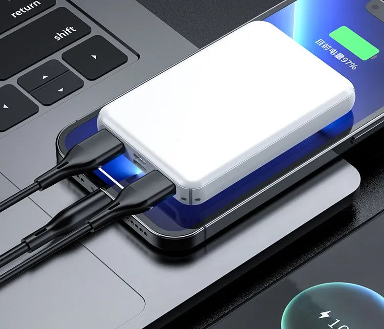 Black electric heating vest power bank with belt clip showing 10000mAh capacity label