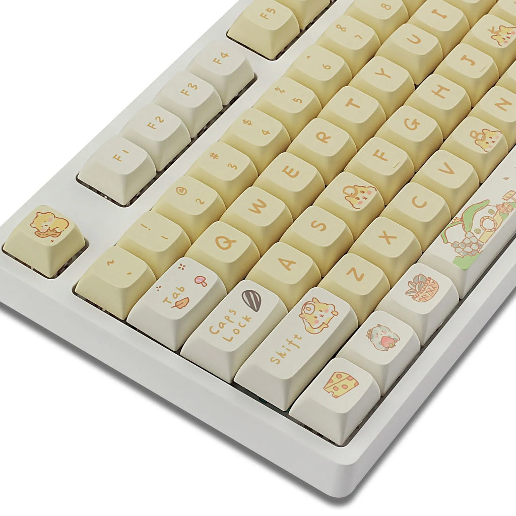 XDA profile mechanical keyboard keycaps in custard colour with mouse grey and yellow designs