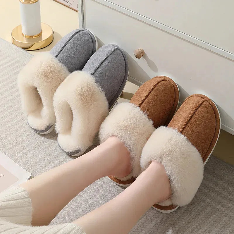 Pair of plush-lined indoor slippers with a flat PVC anti-slip sole, shown in a choice of colours.