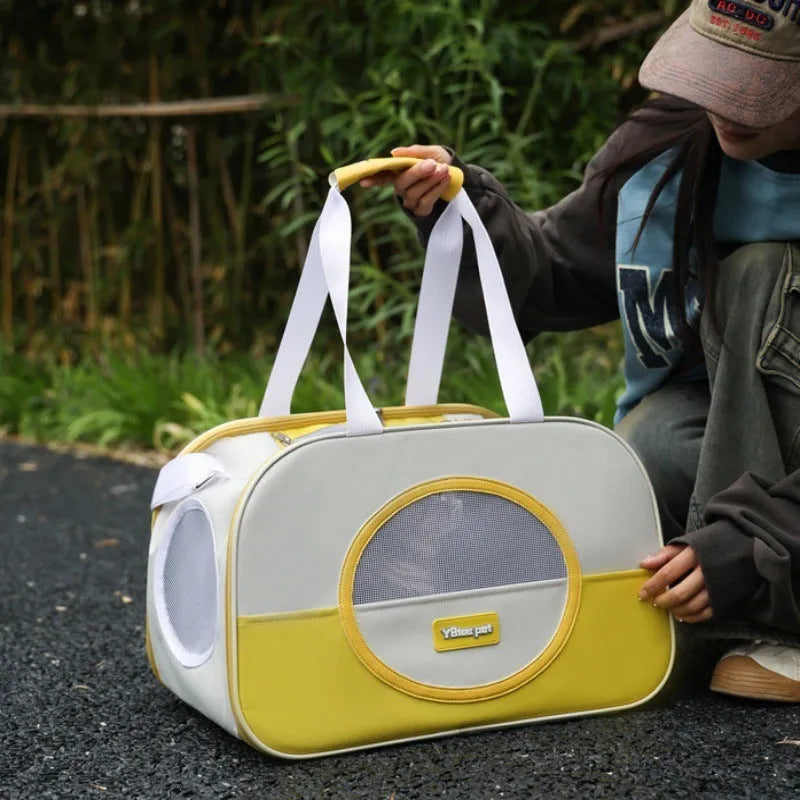 Blue foldable cat backpack made from Oxford cloth, shown with ventilation and shoulder straps.