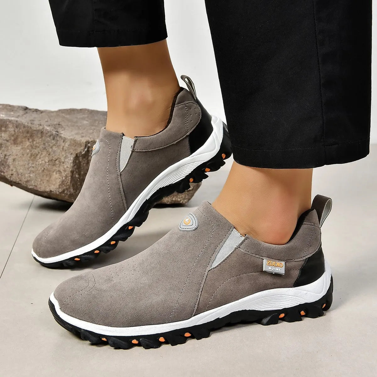 Men's round head shallow mouth thin shoes in gray, shown from the side.