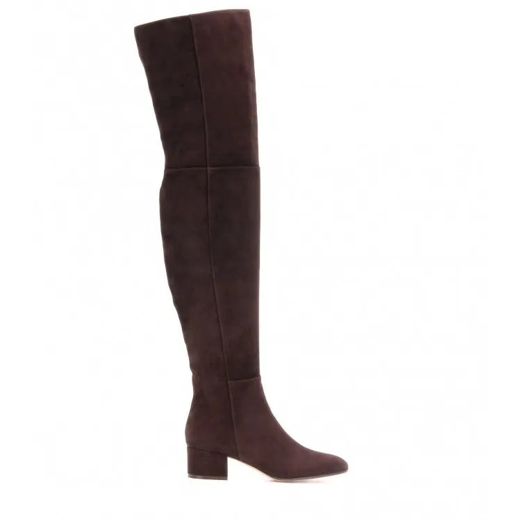 Grey women's suede over-the-knee flat boots with pointed toe and low thick heel on a rubber sole.