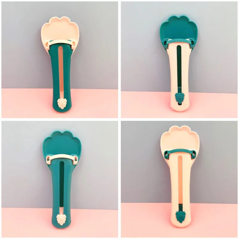 Two-tone pet feed spoon with extrusion scoop and squeezer feeder for liquid food and treats.