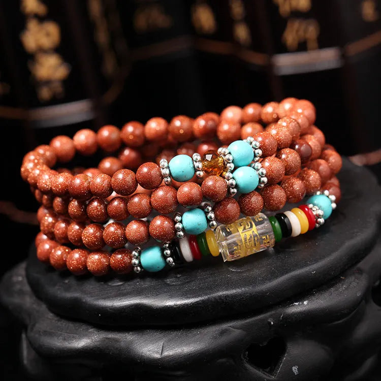 Golden star stone women's mantra bracelet with 108 nugget sand pieces and fu character design