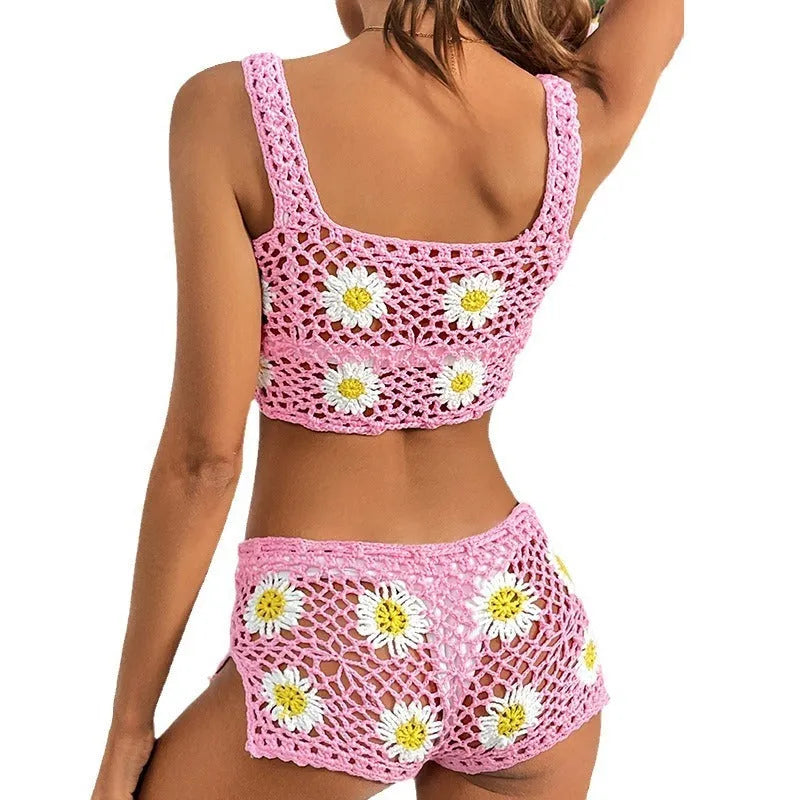 Light green floral bikini swimsuit top and pants on a mannequin.
