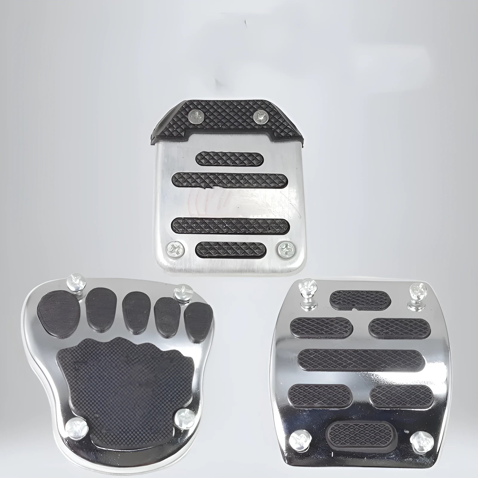 Metal motorcycle brake pedal skid plate accessory shown in three style variations.