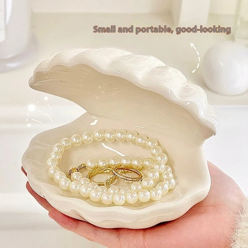 White porcelain storage tray with integrated small night light in modern minimalist style.