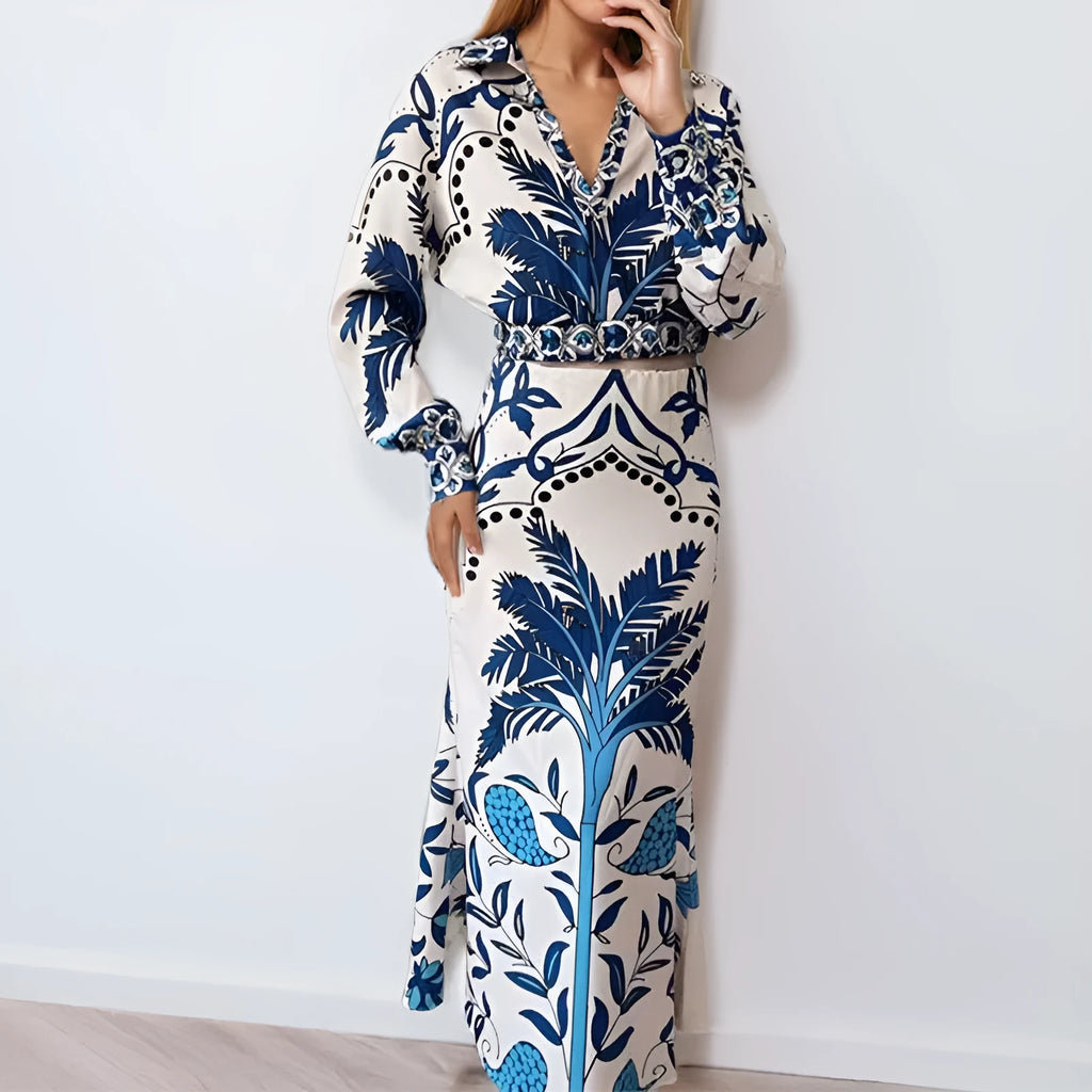 Women's long sleeve top and long skirt two-piece co-ord set in a solid colour.