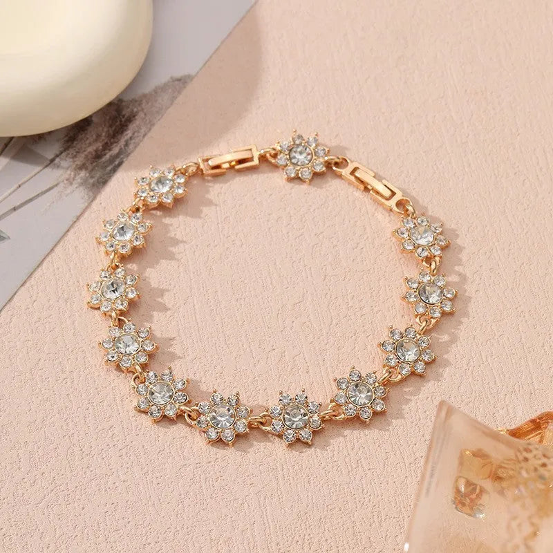 Flower charm bracelet in zinc alloy with electroplated finish and colourful crystal accents