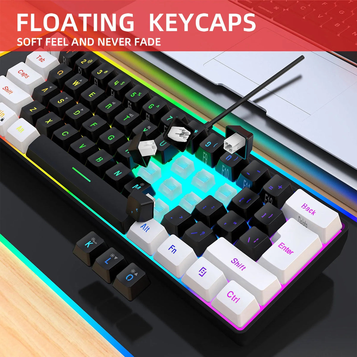 Simple wired 61-key membrane keyboard with compact UK layout in white and black colour scheme