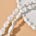 Love heart shaped torch ceramic beads in various colours including cream white, pinks, blues and greens for jewellery making