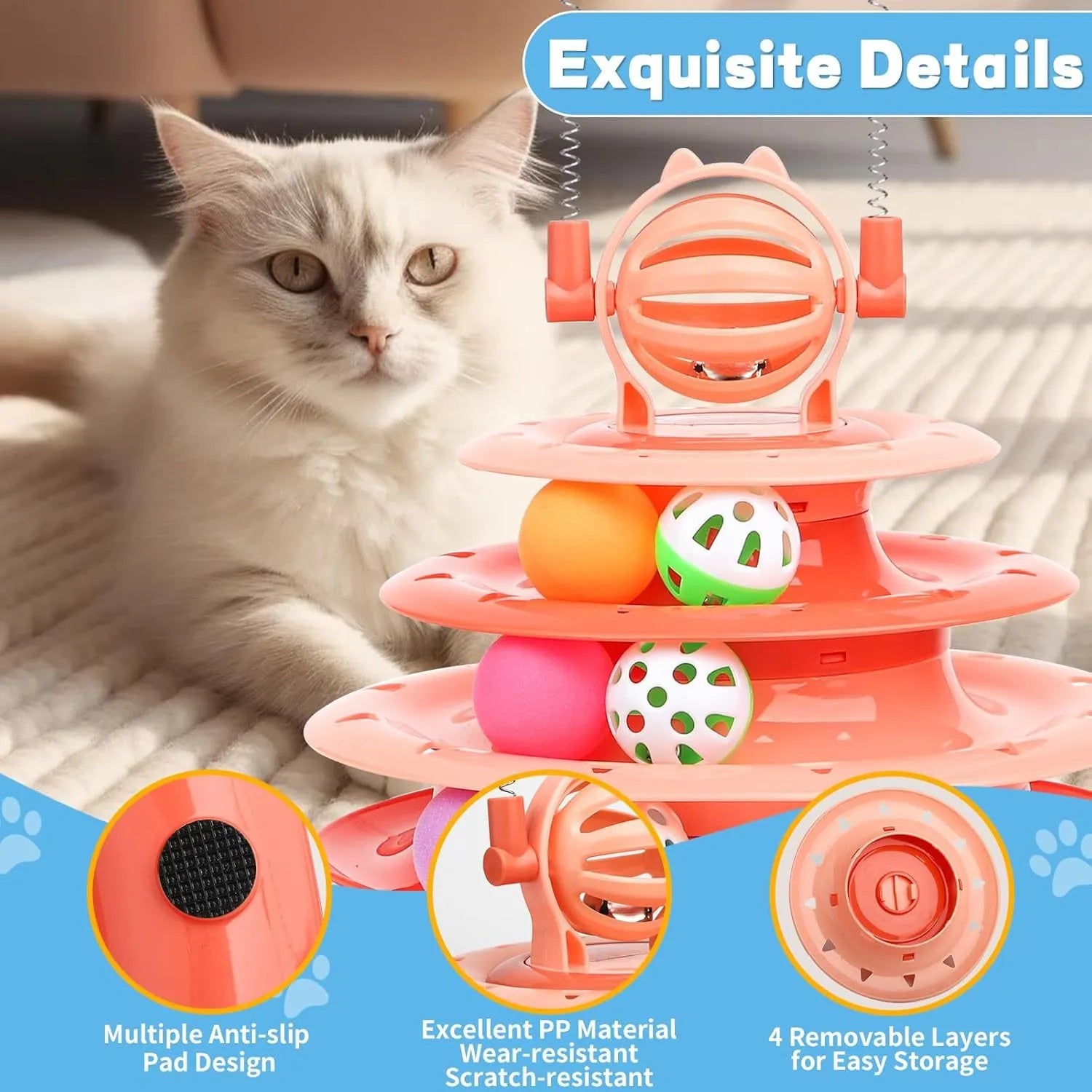 Blue four-tier interactive cat puzzle toy with rolling balls and teaser rods on a table.