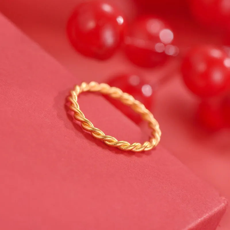 Brass gold plated women's ring showing twist, matte, and glossy style options