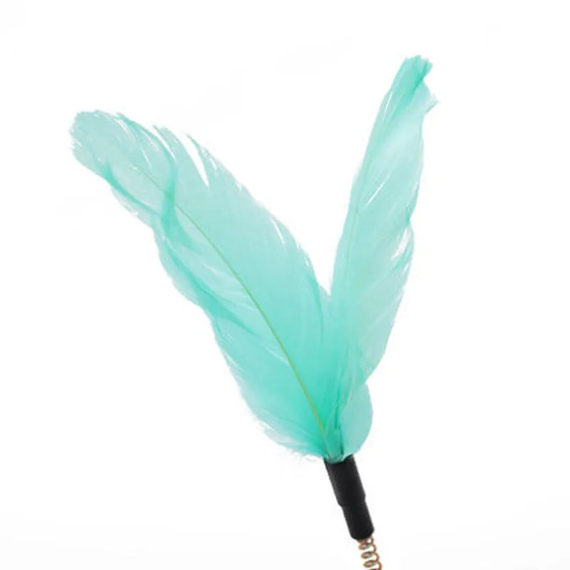 Pink cat tumble spinner toy with feather attachment measuring 17x10cm for independent feline play