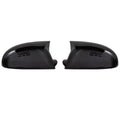 Pair of plastic mirror housings for Volkswagen Old Sagitar in black and carbon fibre finishes.
