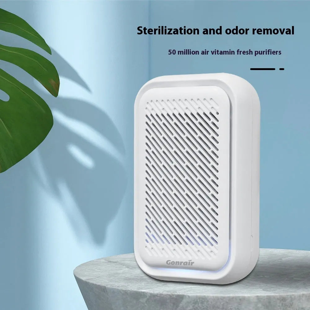 White wall-mounted air purifier with plug-in cord and filter screen