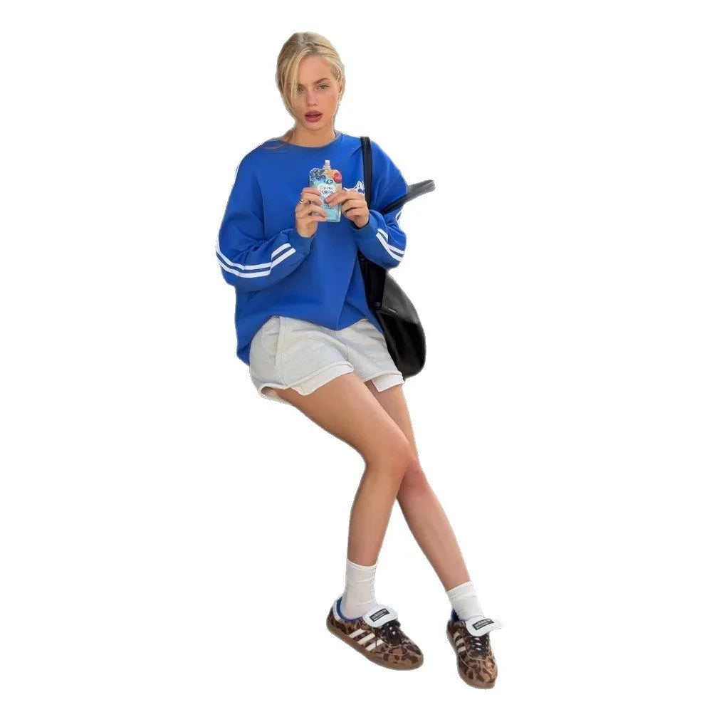 Blue vintage stripe cotton pullover sweater with loose round neck and long sleeves