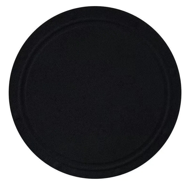 Rubber round cake finger style bath mat for women on a bathroom floor
