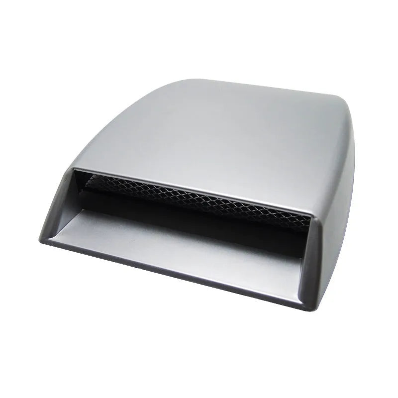 Black, white, and silver ABS plastic decorative simulation air vent for car interior styling.