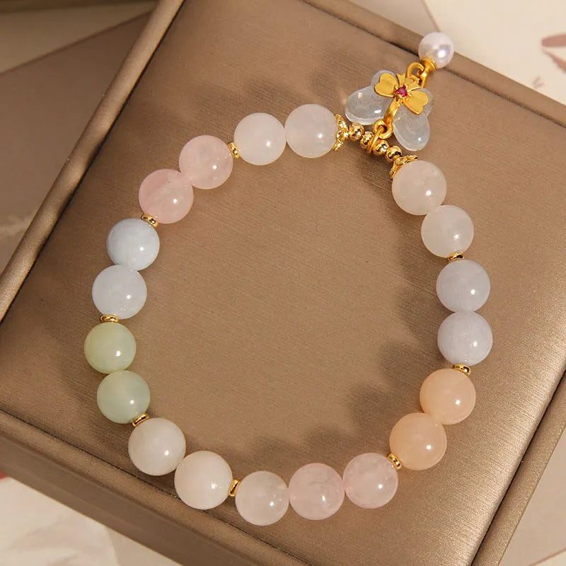 Women's crystal bracelet with a colourful morganite butterfly pendant in an original design.
