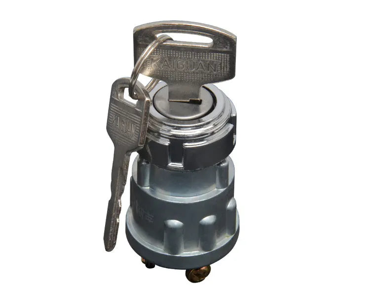 Copper ignition switch with key for trucks and forklifts, showing colour-coded key options
